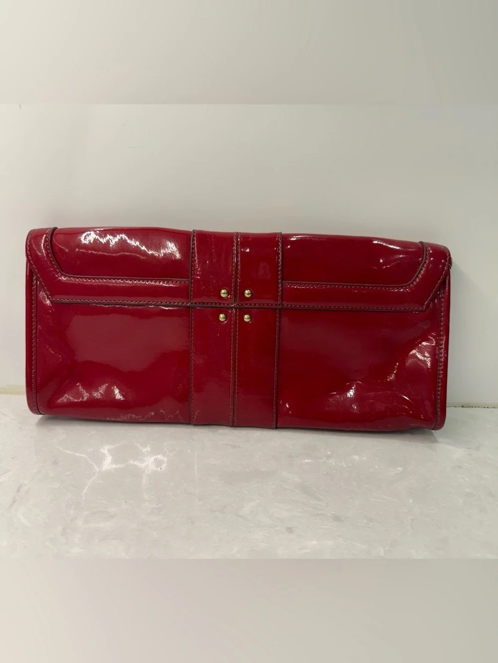 Cole Haan Red Patent Leather Clutch with Gold Accent Buckle